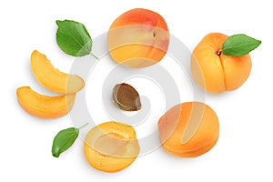 Apricot fruit with half and slices isolated on white background. Clipping path. Top view. Flat lay