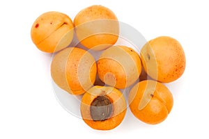 Apricot fruits isolated on white background. Top view. Flat lay pattern