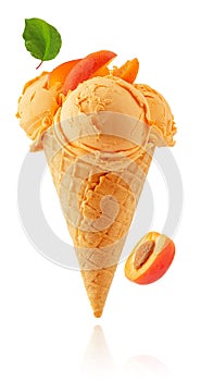Apricot ice cream cone isolated on white background with clipping path.