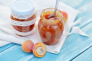 Apricot jam in glass jars