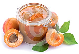 Apricot jam and ripe apricots.