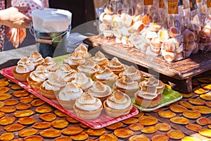 Apricot meringue cupcake for sale at Apcicot Fair in Porreres, Mallorca photo