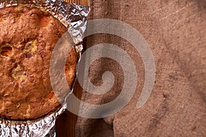 apricot pie baked in foil with ingredients cinnamon, abricot, eggs, flour, milk and sugar