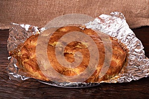 apricot pie baked in foil with ingredients cinnamon, abricot, eggs, flour, milk and sugar