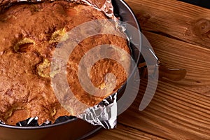 Apricot pie baked in foil with ingredients cinnamon, abricot, eggs, flour, milk and sugar