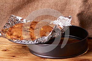 apricot pie baked in foil with ingredients cinnamon, abricot, eggs, flour, milk and sugar