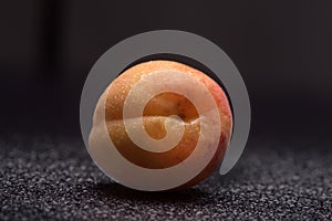 Apricot with water drops