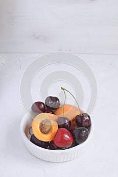 Summer fruit and berries concept Harvesting Organic fruits White background Copy space