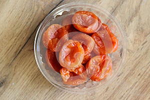 juicy dried apricot in plastic packaging photo