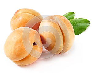 Apricots with leaf retouched and isolated white background