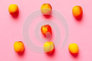 Apricots set of six over a fuscia background