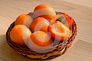 Apricots in a small basket , healthy and organic