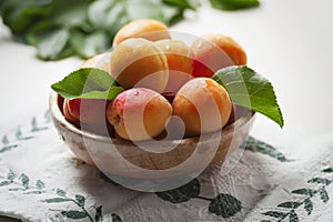 Apricots in a wood bowl