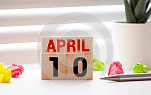 April 10th, Day 10 of month, Birthday, Anniversary, wooden block calendar on white wooden background