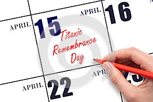 April 15. Hand writing text Titanic Remembrance Day on calendar date. Save the date.