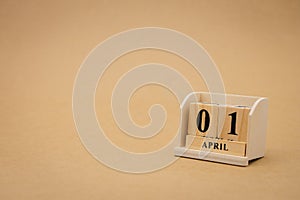 April 1st wooden calendar on vintage wood abstract background. April Fools` Day is actually just around the corner April 1 with