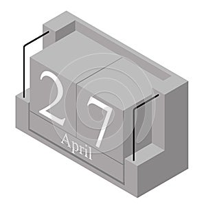 April 27th date on a single day calendar. Gray wood block calendar present date 27 and month April isolated on white background.