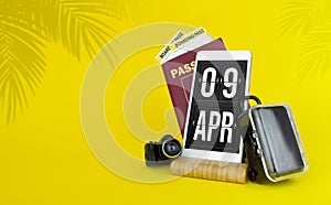 April 9th. Day 9 of month, Calendar date. Mechanical calendar display on your smartphone. The concept of travel. Spring month, day