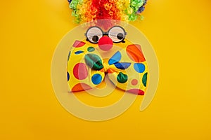 April Fool's day concept. Clown on yellow background