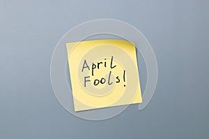 April fools day reminder on yellow sticky note. be aware and do not let be fooled