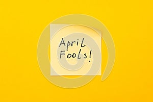 April fools day reminder on yellow sticky note. be aware and do not let be fooled