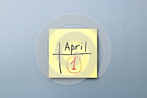 April fools day reminder on yellow sticky note. be aware and do not let be fooled