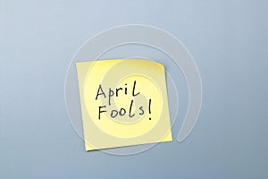 April fools day reminder on yellow sticky note. be aware and do not let be fooled