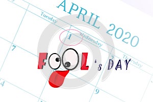 April Fools` Day.  the text `fool`s day`  with  smile sysmbol