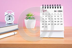 April Mini desk calendar for 2024 year on worktable