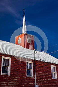 APRIL 27, 2017 - PARADOX COLORADO - Paradox Community Center and Church with cross, off State. USA, Red