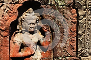 Apsara carved on temple wall in Siem Reap, Cambodi