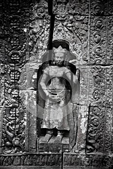 Apsara dancer carving at Angkor Wat photo