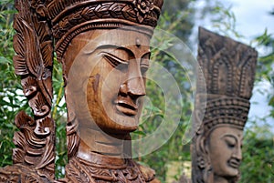 Apsara figures in garden photo