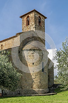 The apse of the Parish church of San Romolo a Gaville, Figline and Incisa Valdarno, Florence, Italy, framed by olive trees