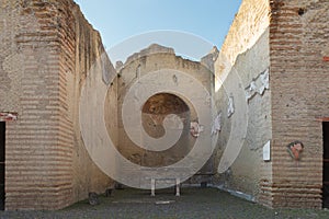 Apsidal room (Aula Absidata) in Palaestra in ancient Ercolano (Herculaneum) city ruins