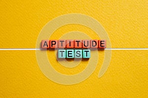 Aptitude test - word concept on cubes, text photo