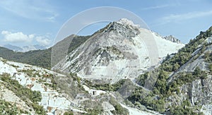 Lanscape of Apuane valley with large quarry, Carrara, Italy photo