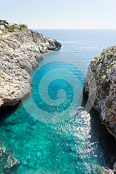 Apulia, Leuca, Grotto of Ciolo - Refelcting sunlight on the water surface