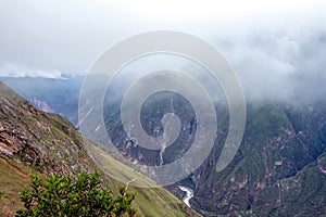 Apurimac river : Green steep slopes of valley with water in the middle, the Choquequirao trek, Peru