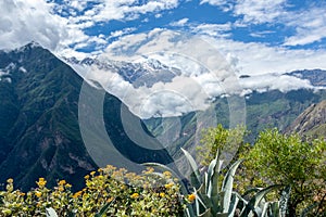 The Apurimac river valley: Green steep slopes of deep canyon with lush vegetation, the Choquequirao trek, Peru