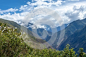 The Apurimac river valley: Green steep slopes of deep canyon with lush vegetation, the Choquequirao trek, Peru