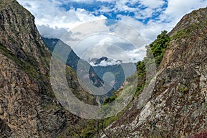 The Apurimac river valley: Green steep slopes of deep canyon with lush vegetation, the Choquequirao trek, Peru