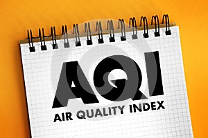 AQI - Air Quality Index is used by government agencies to communicate to the public how polluted the air, acronym text concept for