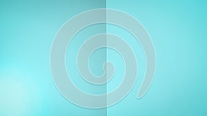 Aqua blue color background. Turquoise mint color. 16:9. Abstracts gradient background like an open book