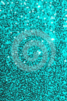 Aqua blue sequins fabric pattern texture. Fashion abstract background