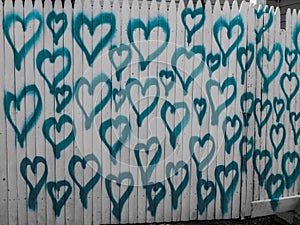 Aqua Hearts On A White Picket Fence