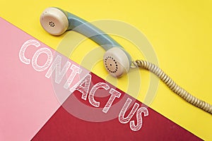 Aqua old retro phone with contact us concept