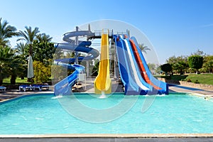 Aqua park with water slides in luxury hotel