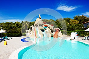 Aqua park with water slides in luxury hotel