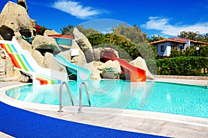 Aqua park with water slides in luxury hotel